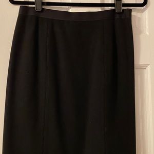 Eli’s Tahari black stretchy skirt.